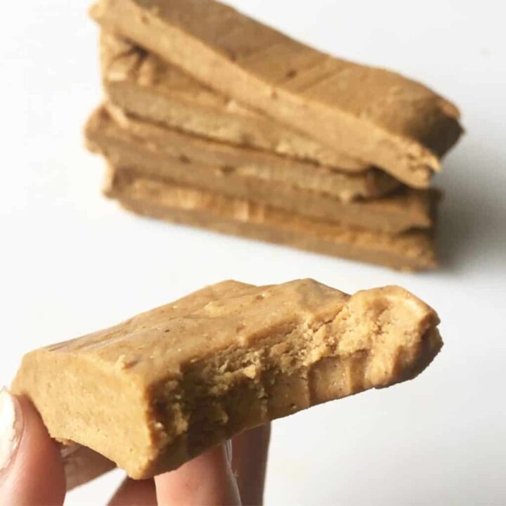 Close up bite of a peanut butter perfect bar