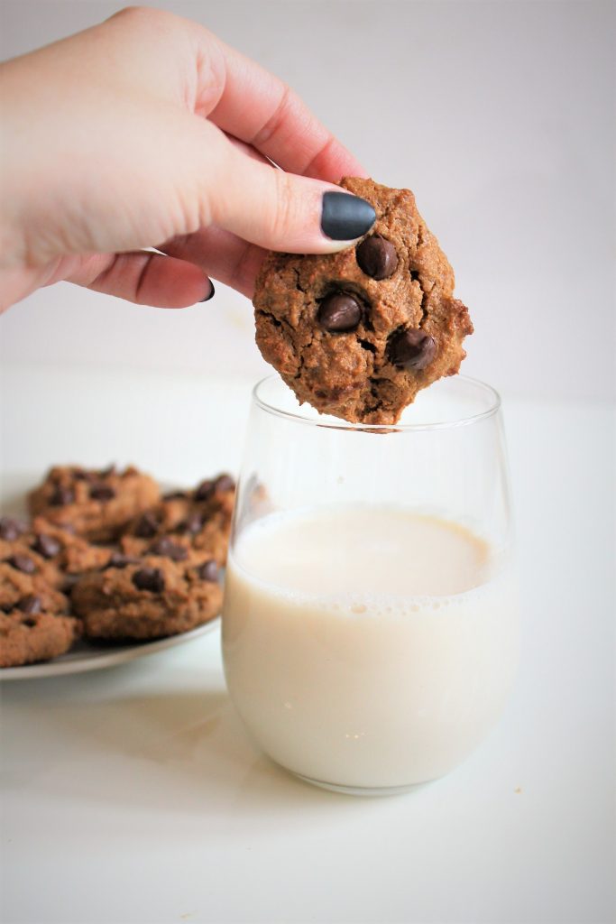 Dunking a flourless chocolate chip cookie in some almond milk