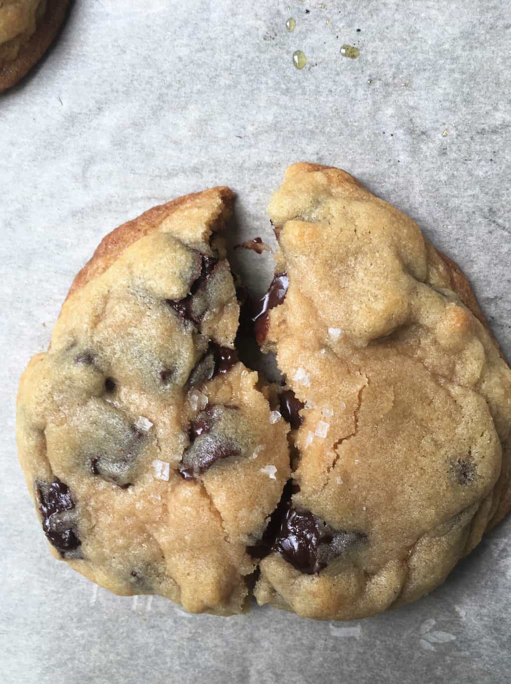 bakery chocolate chip cookie split in half