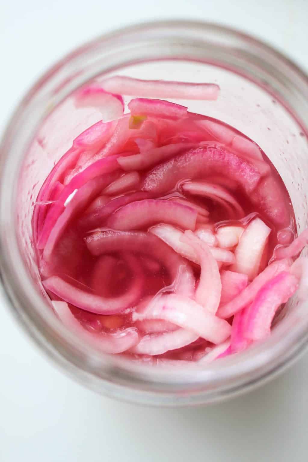 jar of pink pickled onions