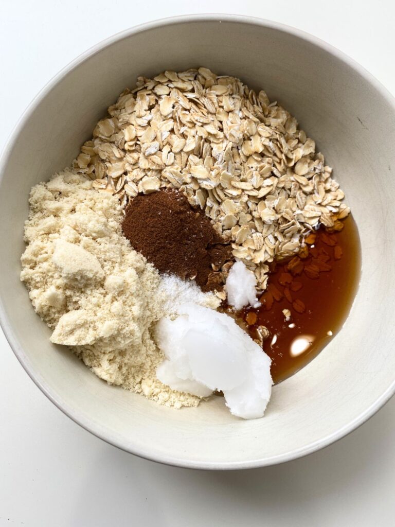 ingredient shot of all the ingredients in a bowl to make a blueberry crumb topping