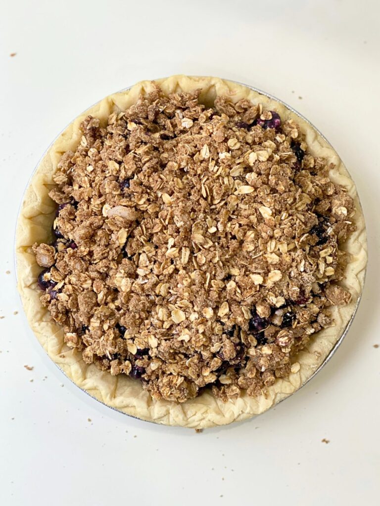 unbaked blueberry pie birds eye view 